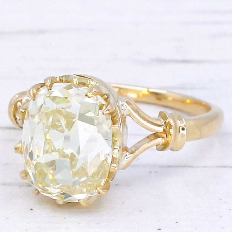 Antique 5.02 Carat Light Yellow Old Cut Diamond Solitaire Ring, circa 1900